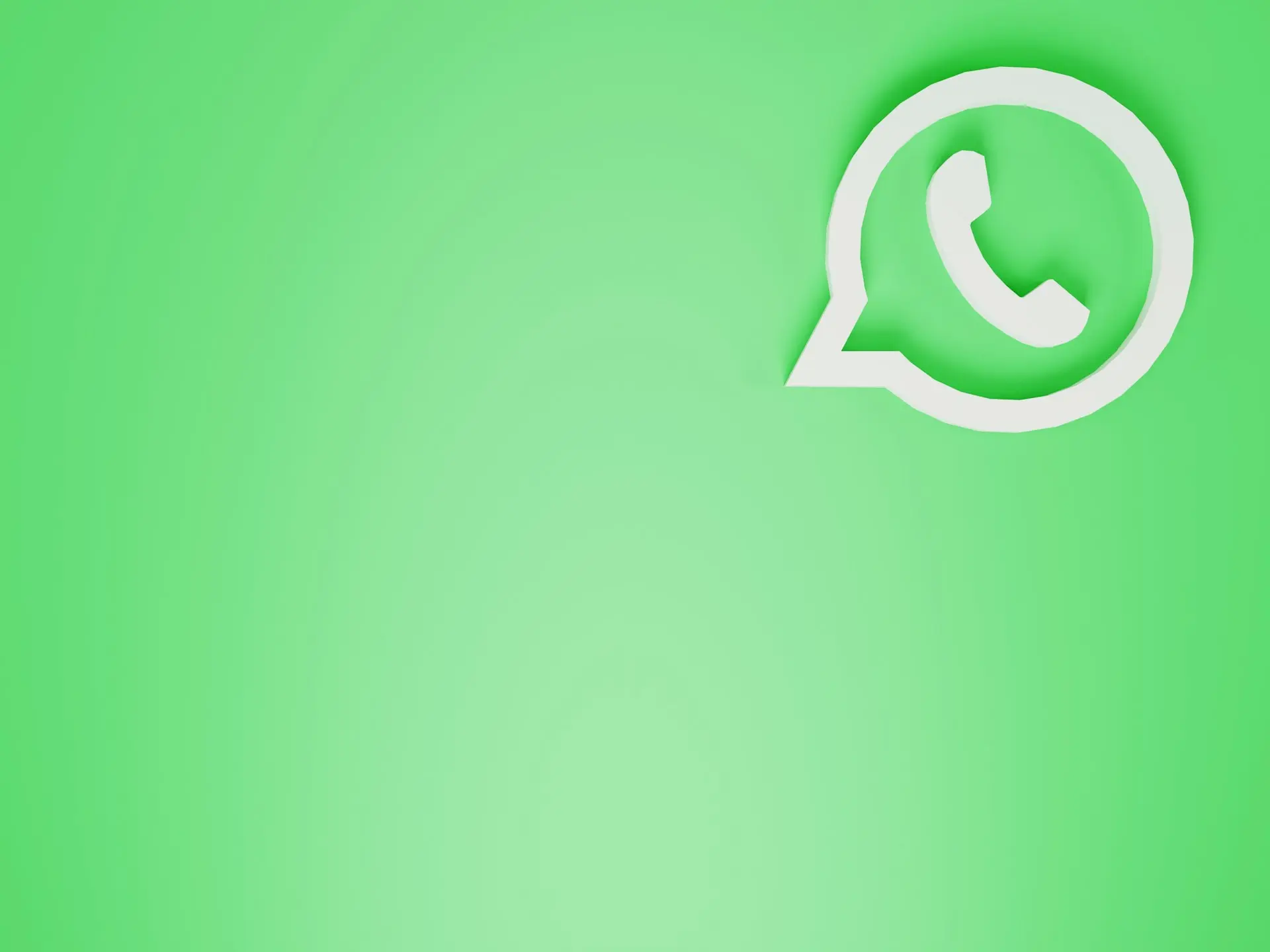a green wall with a white phone on it
